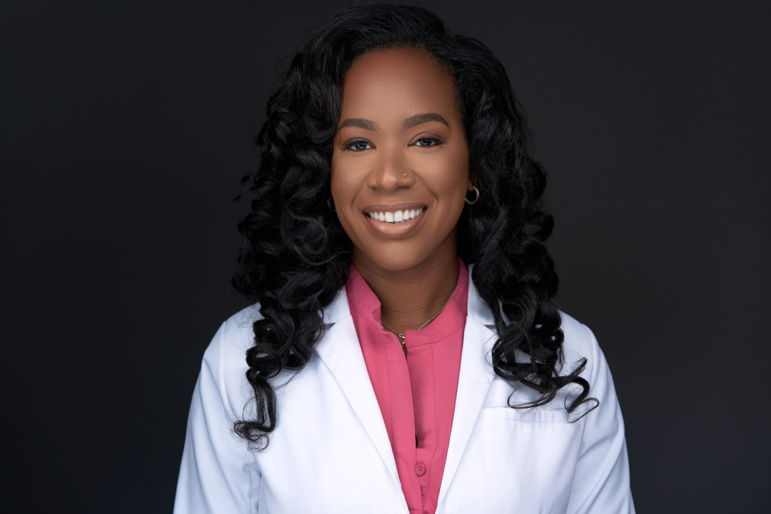 Nurse Resha a medspa owner and coaching client of Keep It Simple Coach Dr. Yam